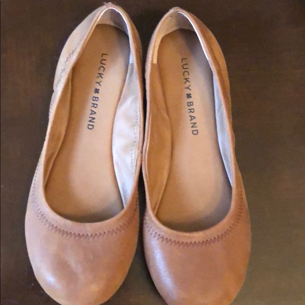 Size 7 Lucky Brand brown slip-in shoes.